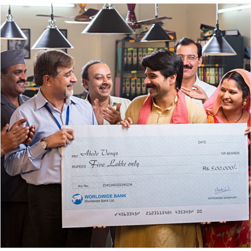 Indian village business owner receiving funds